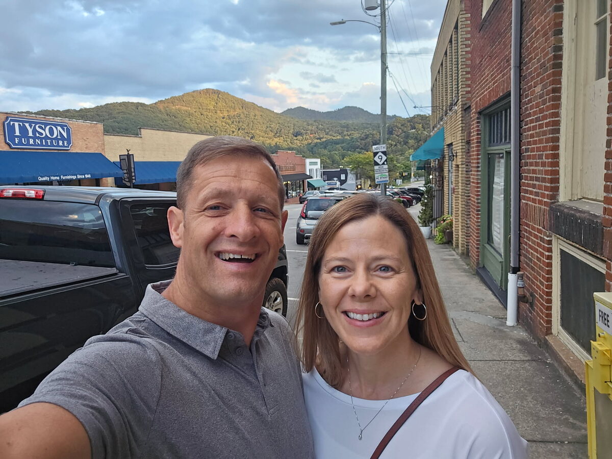 Merrill and Emily Burrows on a mountain-town street