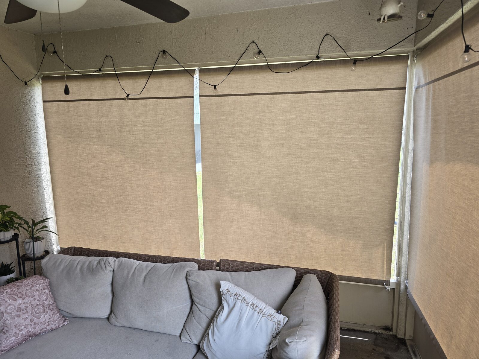 Rolldown shade on a screened lanai