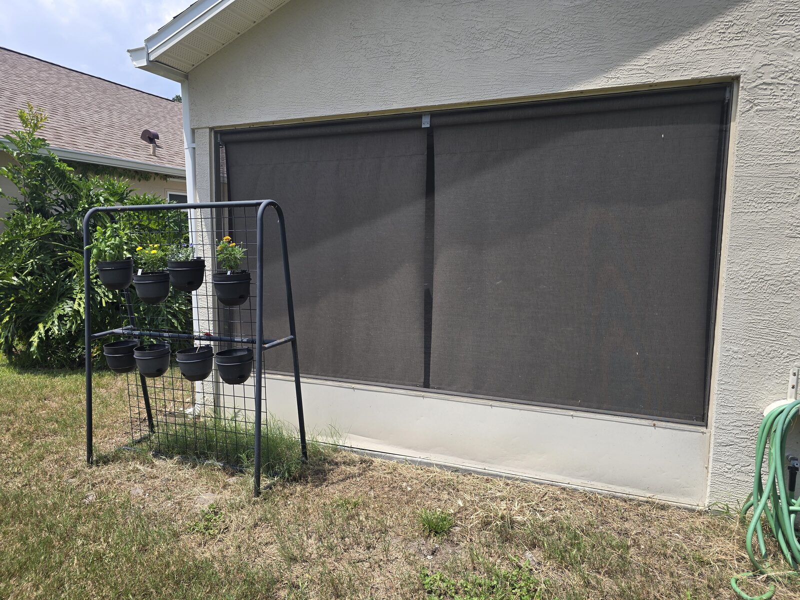 Rolldown shade on a Florida pool enclosure