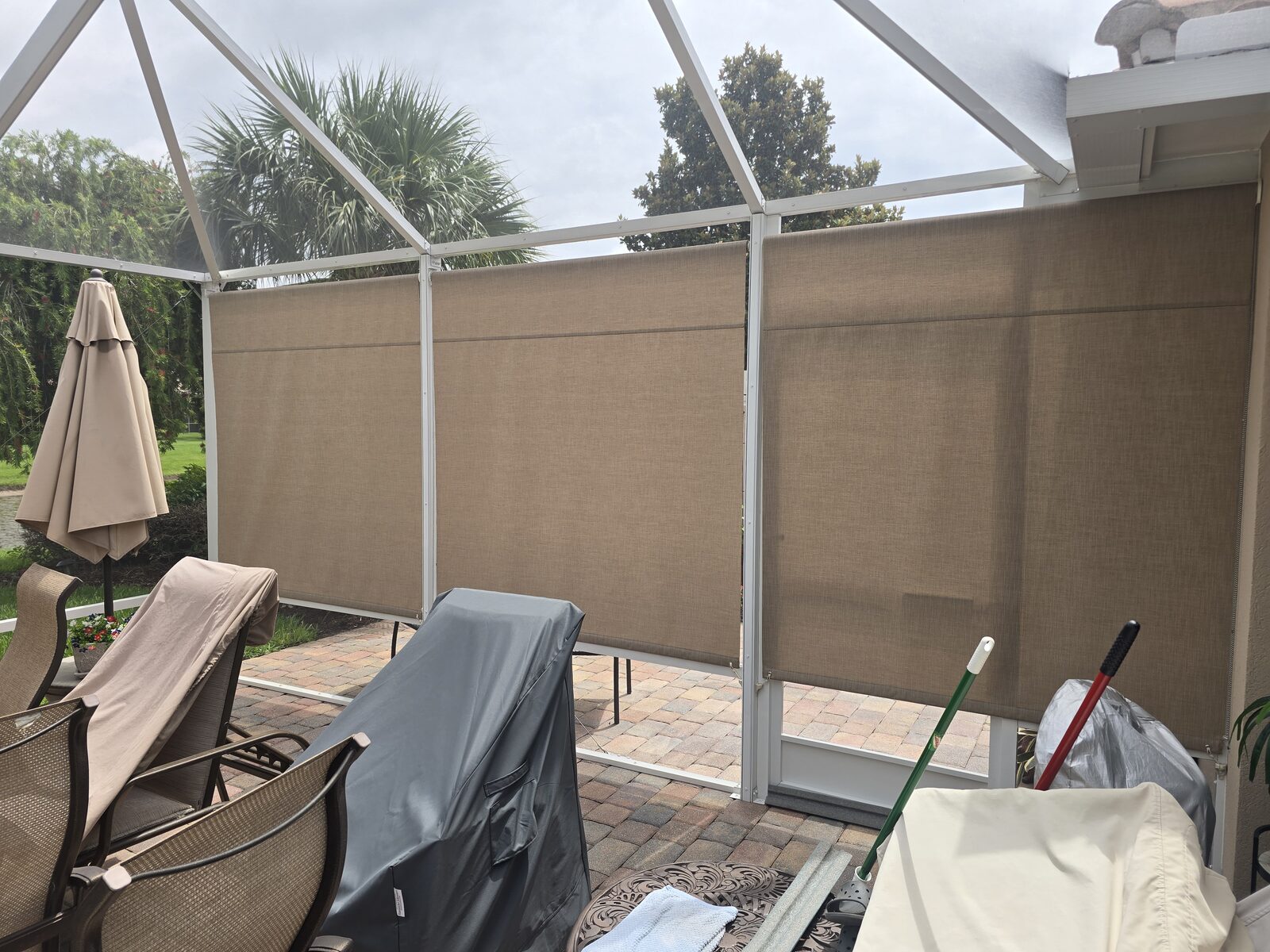 Rolldown shade providing privacy on a lanai